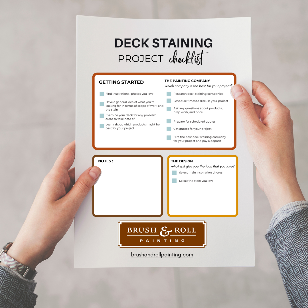Person holding paper with deck staining checklist.